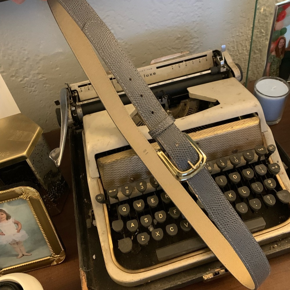 Grey belt with gold buckle